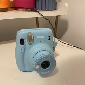 Blue instax mini 11 polaroid